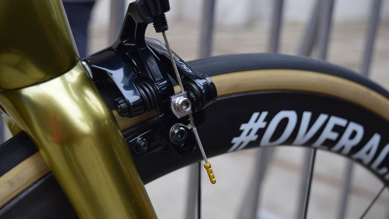 The brake cable ends also receive a golden touch