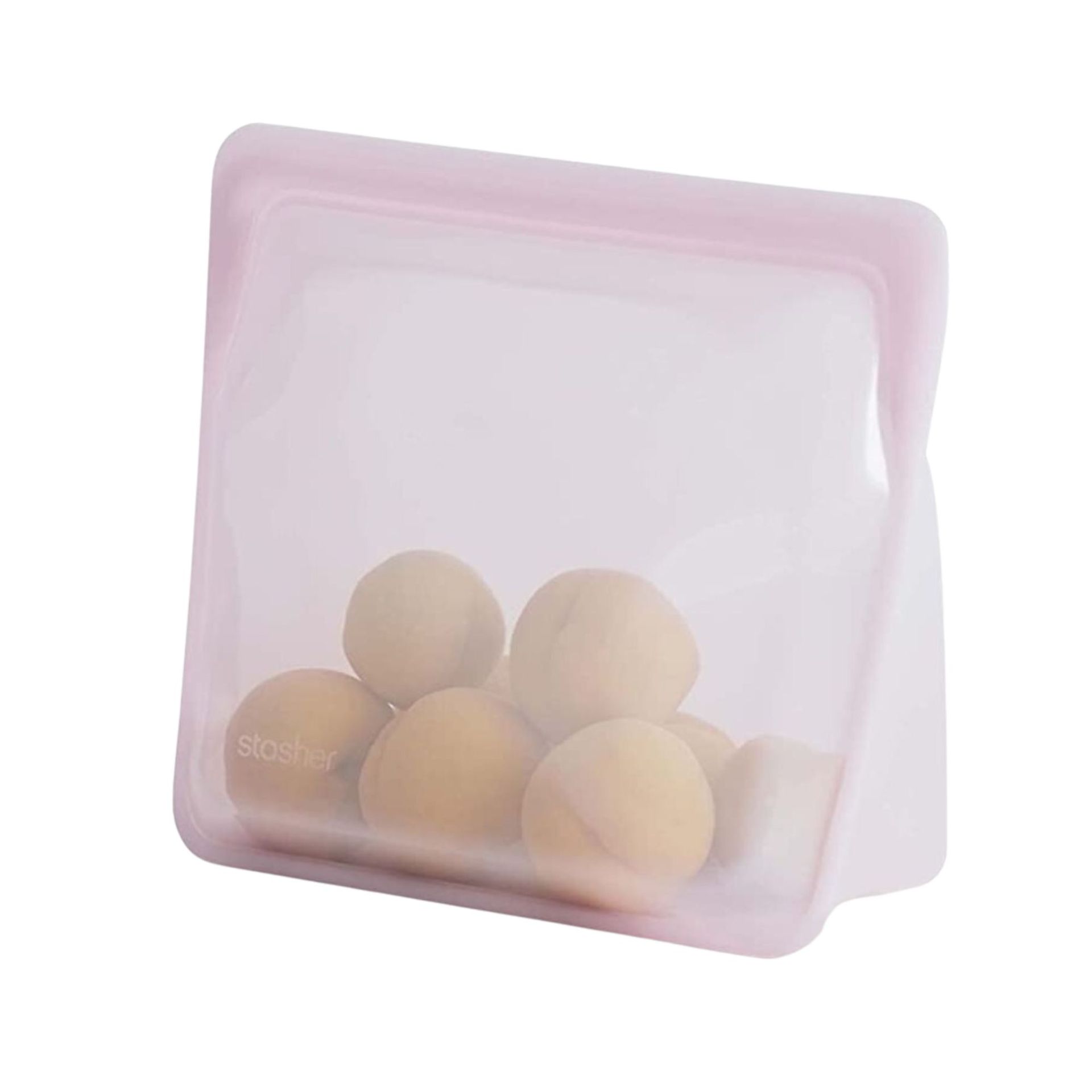 Kantong silikon merah muda dengan buah di dalamnya