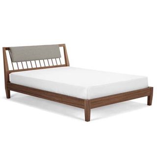 Walnut Mara king-sized bed with white bedlinen