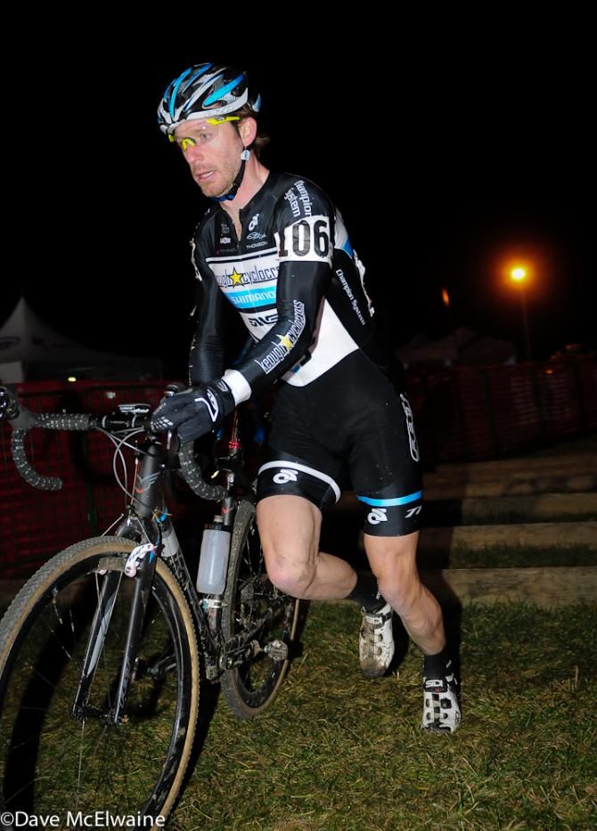 Shawn Milne (Keough Cyclocross) running a small set of barriers