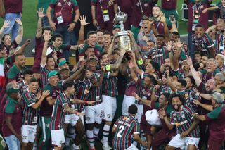Fluminense players celebrate after beating Boca Juniors to win the Copa Libertadores in November 2023.