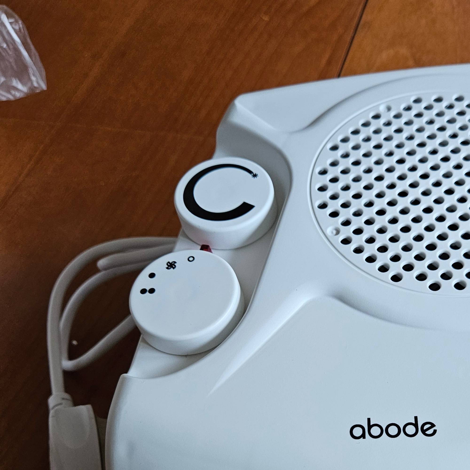 white fan heater turn controls