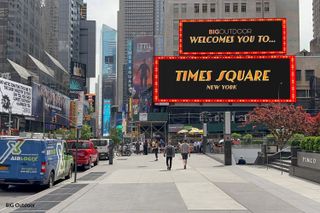 A bright SNA Display LED board welcomes visitors to Times Square in New York City. 