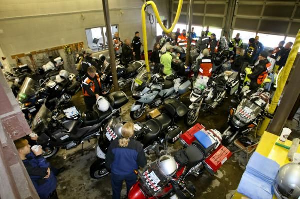 After some discussion the race motos find shelter at the local fire station