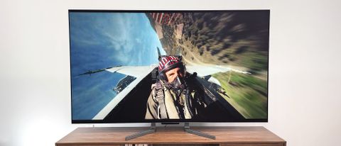 LG M3 OLED shown in living room playing a scene from Top Gun: Maverick
