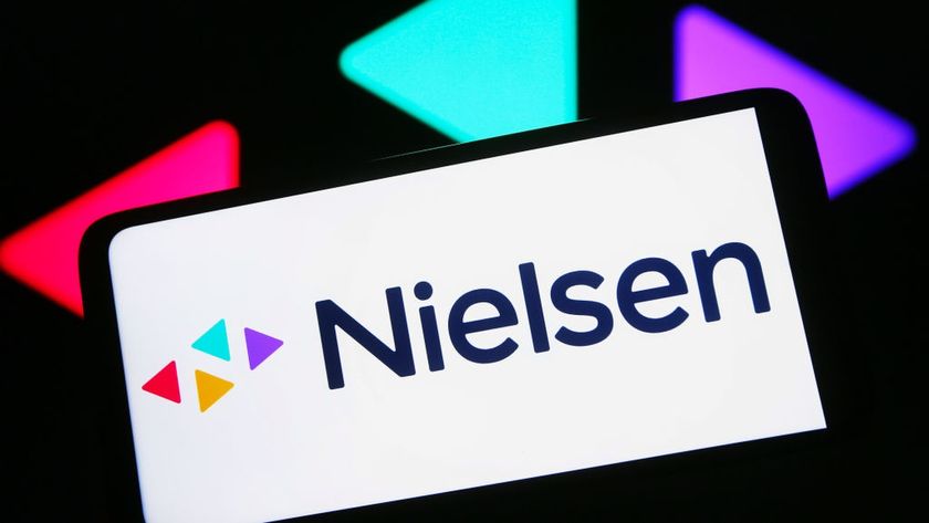 In this photo illustration, Nielsen Holdings logo is seen on a smartphone screen.