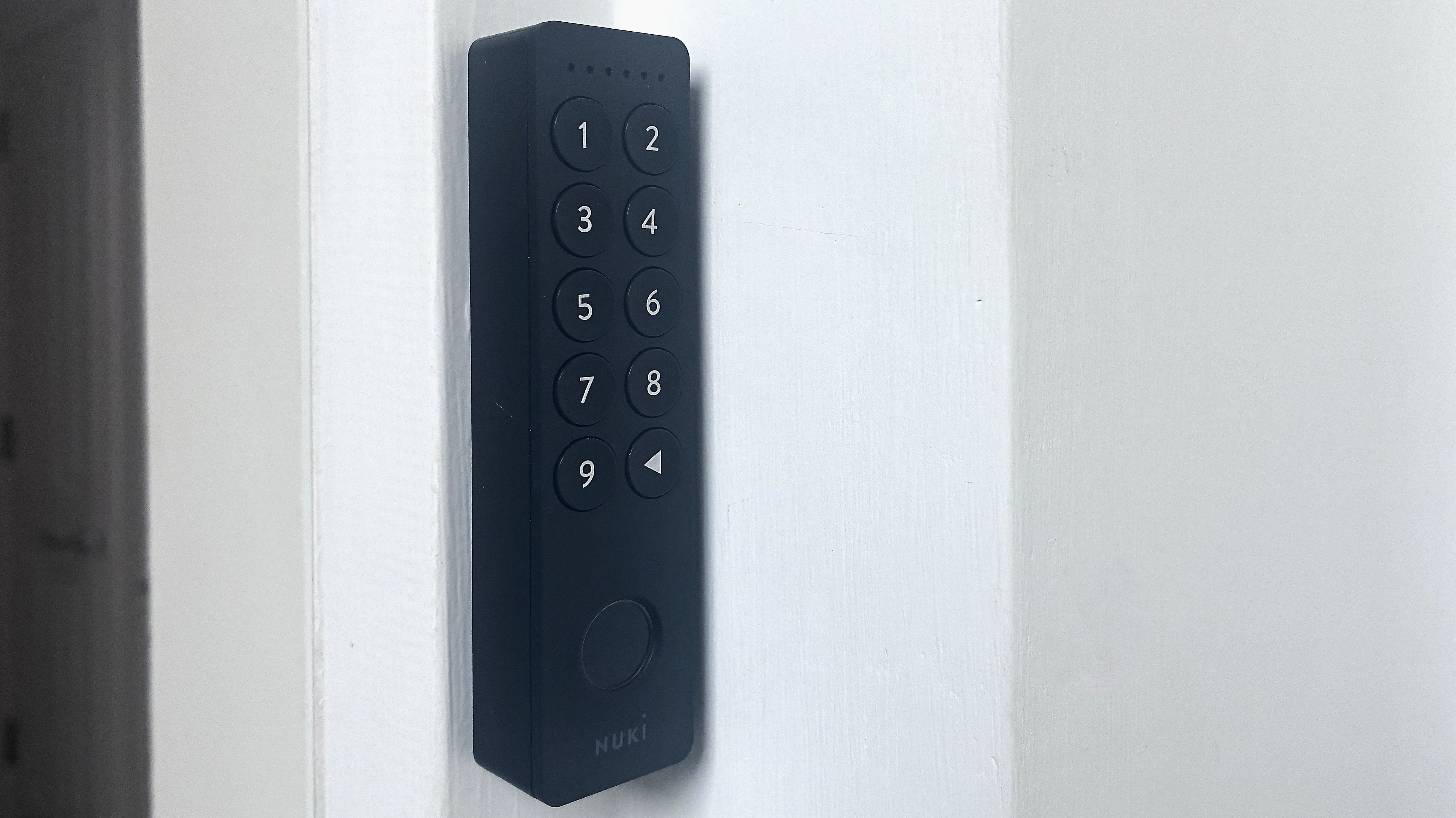 Ultion Nuki smart lock keypad installed on door frame