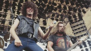 Vocalist Paul Mario Day and guitarist Kenny Cox of heavy metal group More perform live on stage at the Monsters of Rock festival at Donington Park, Leicestershire, 22nd August 1981. (Photo by Michael Putland/Getty Images)