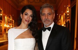 Amal Clooney and George Clooney attend a dinner to celebrate The Prince's Trust, hosted by Prince Charles, Prince of Wales