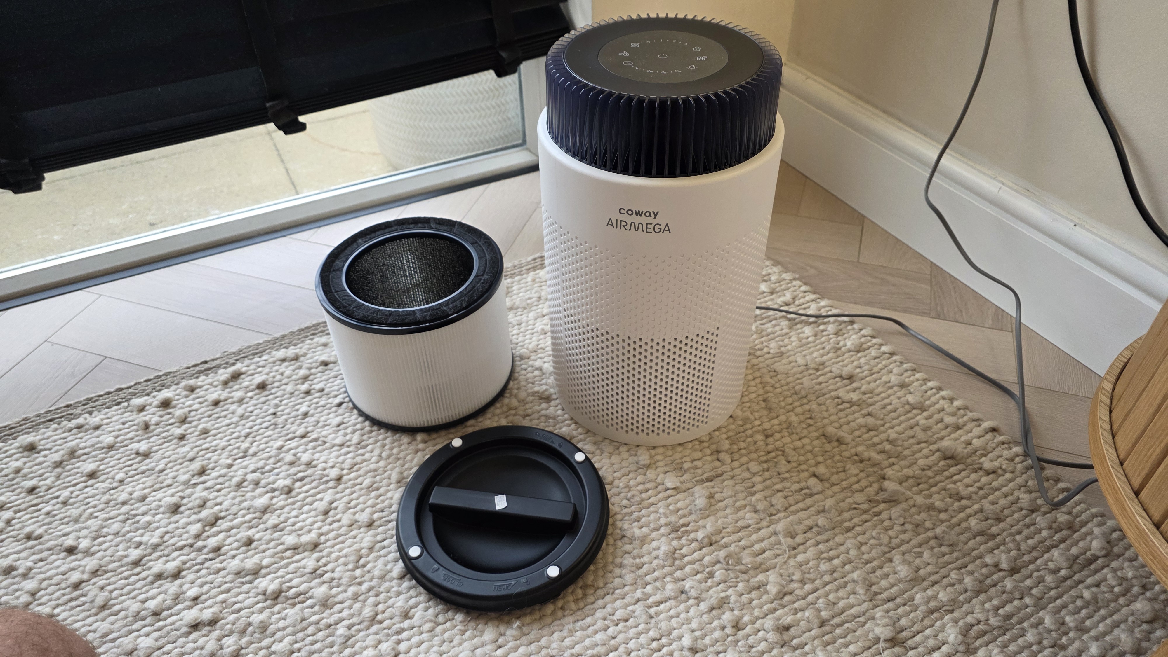 The The Coway Airmega 100's filter separated from the rest of the device.