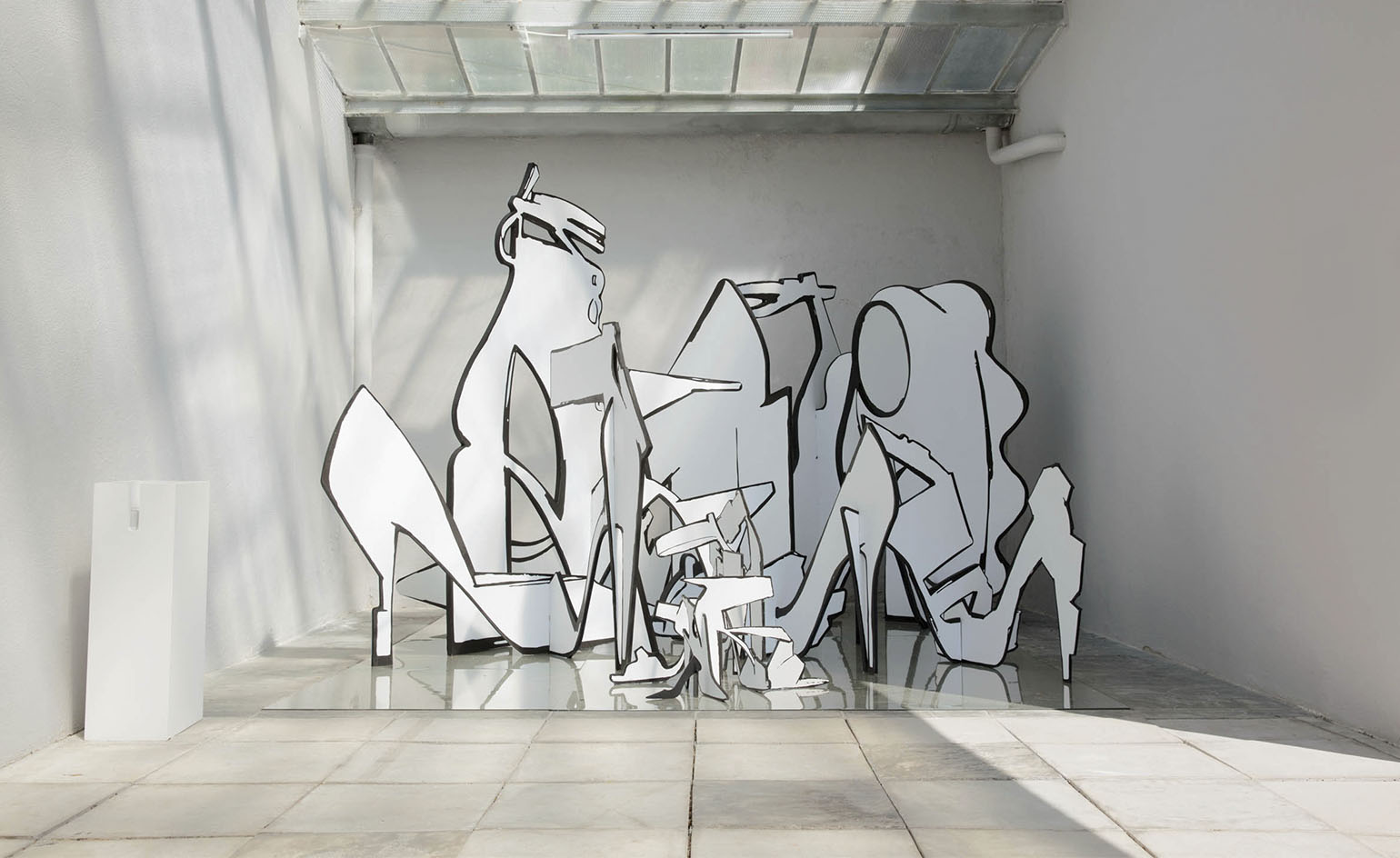 An abstract chronology of shoes stand tall in Pierre Hardy's 'Equilibrium' sculpture, which was crafted especially for the festival