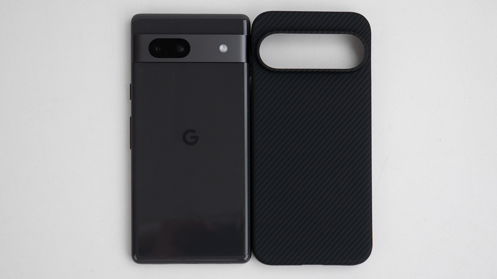A Thinborne aramid fiber case made for an upcoming Google Pixel 9 phone alongside a Google Pixel 7a