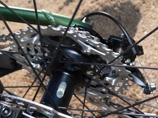 Pins protruding from the backside of the new cassette prevent an overshifted chain from damaging spokes.
