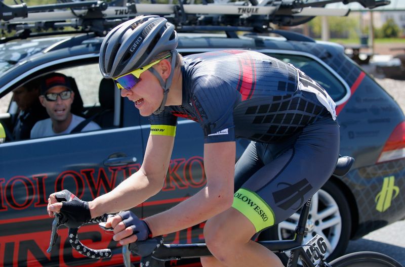 Team DS Chris Wherry giving Toms Skujins (Hincapie Racing Team) encouragement from the car