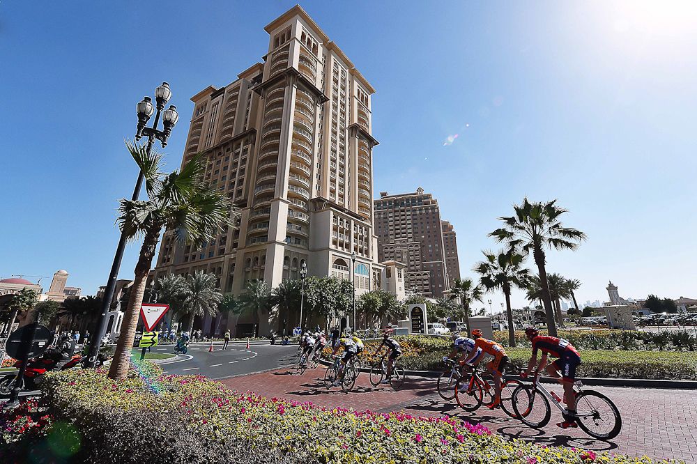 The peloton heads toward Doha City during stage 2 in Qatar