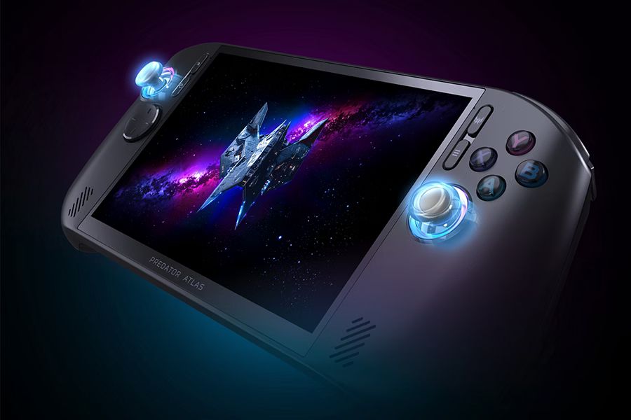 Black Acer Predator Atlas 8 handheld gaming device with a spaceship scene on the screen and illuminated controls.