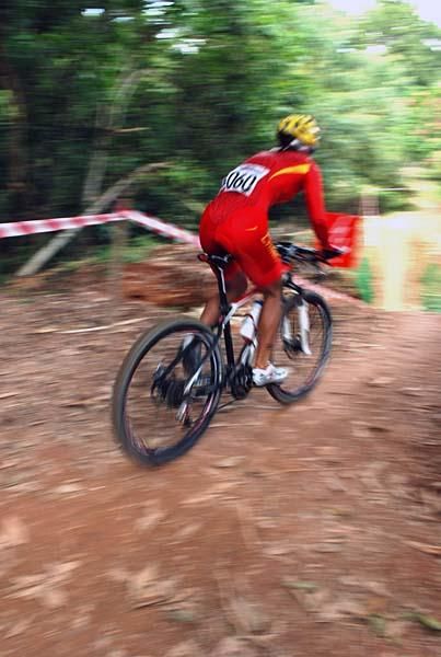 Ren Chengyuan (People's Republic of China) rides to a win.
