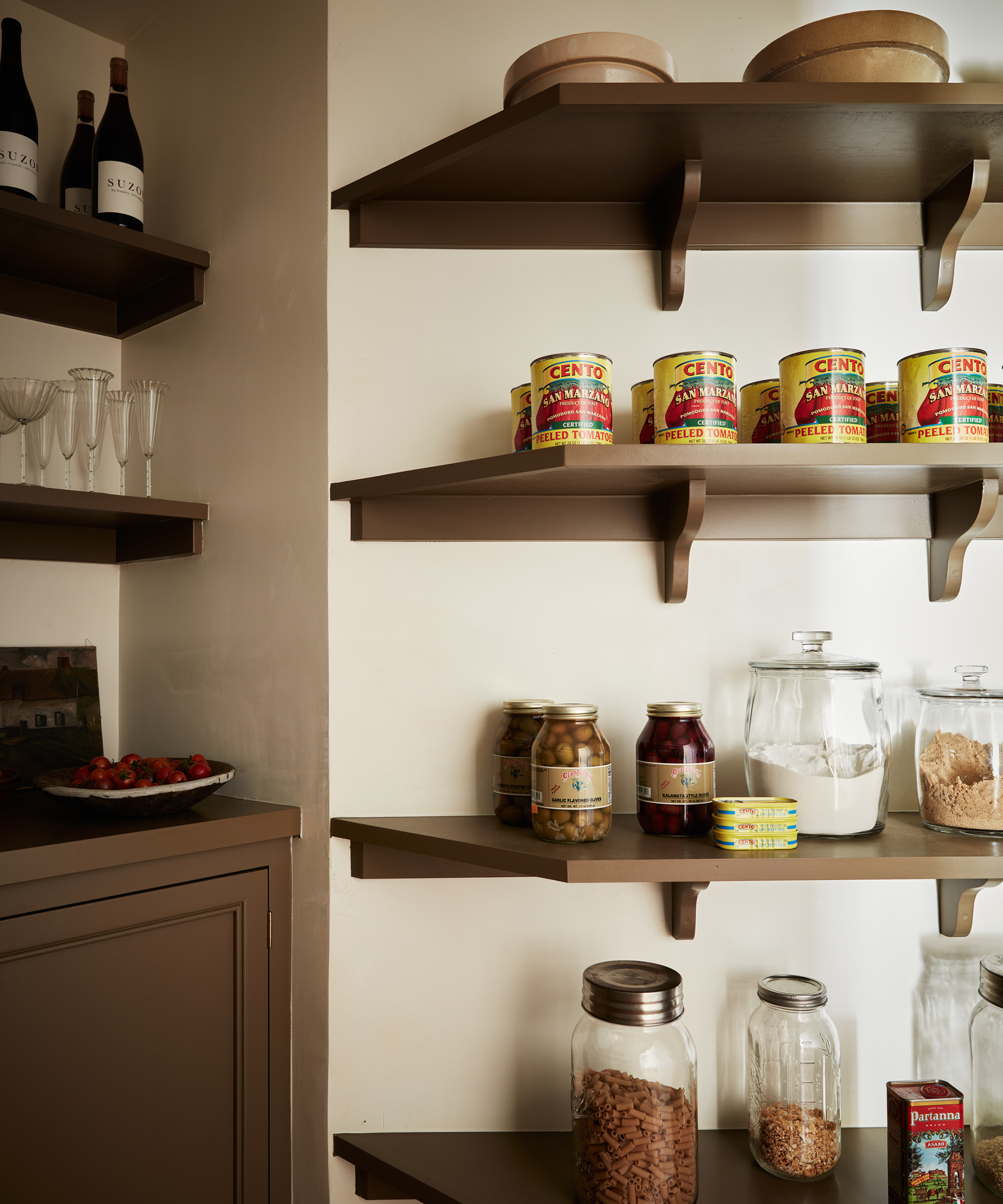 brown shelves in a kitchen