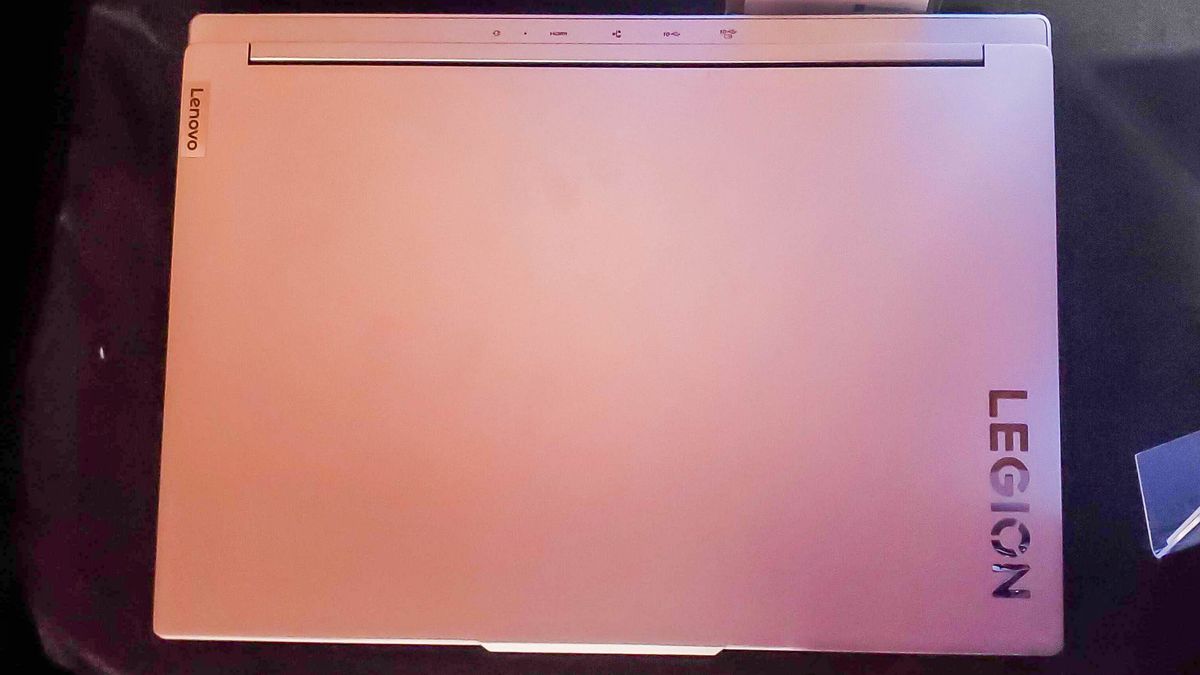 dark laptop closed top down view