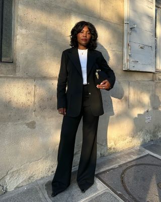 woman in black blazer and pants