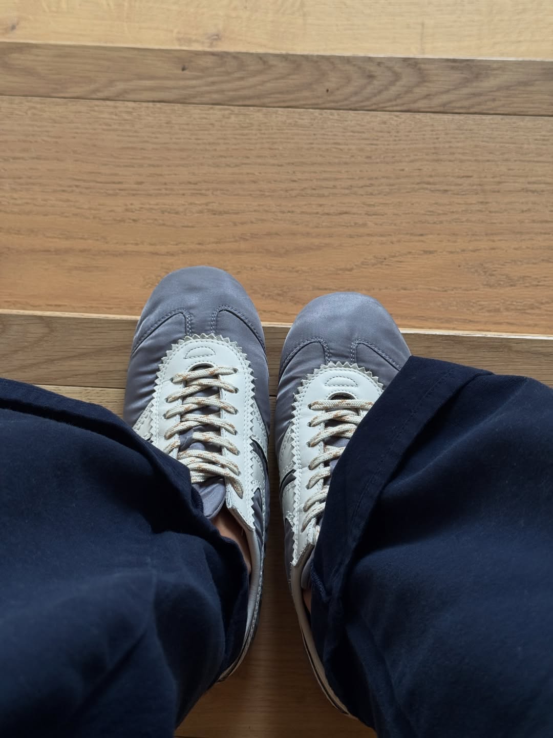 @smythsisters wearing satin trainers