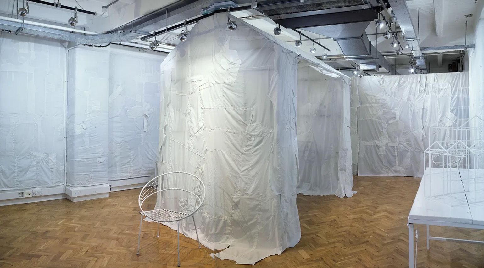 Harris Elliott’s metamorphosing London ‘social salon’ debuts with a marketplace of white shirts