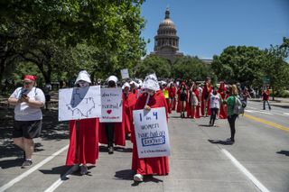 Pro choice protesters march down Congress Avenue at a protest outside the Texas state capitol on May 29, 2021 in Austin, Texas.