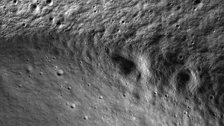 The rim of Marvin crater, about 16 miles (26 kilometers) from the lunar south pole.