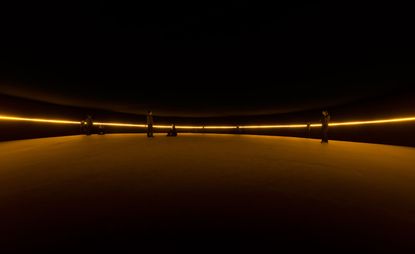 'Contact', the namesake piece in Olafur Eliasson's new show at the Fondation Louis Vuitton, uses an inclined floor, mirrors and a horizontal amber light to create the sensation of peering out into space from the pole of a planet. 