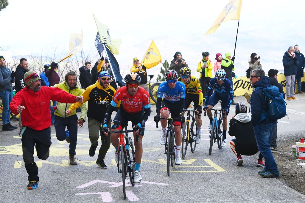 CARPEGNA ITALY MARCH 12 LR Mikel Landa Meana of Spain and Team Bahrain Victorious Tadej Pogacar of Slovenia and UAE Team Emirates Blue Leader Jersey Jonas Vingegaard Rasmussen of Denmark and Team Jumbo Visma and Alex Aranburu Deba of Spain and Movistar Team compete in the breakaway while fans cheer during the 57th TirrenoAdriatico 2022 Stage 6 a 215km stage from Apecchio to Carpegna 746m TirrenoAdriatico WorldTour on March 12 2022 in Carpegna Italy Photo by Tim de WaeleGetty Images