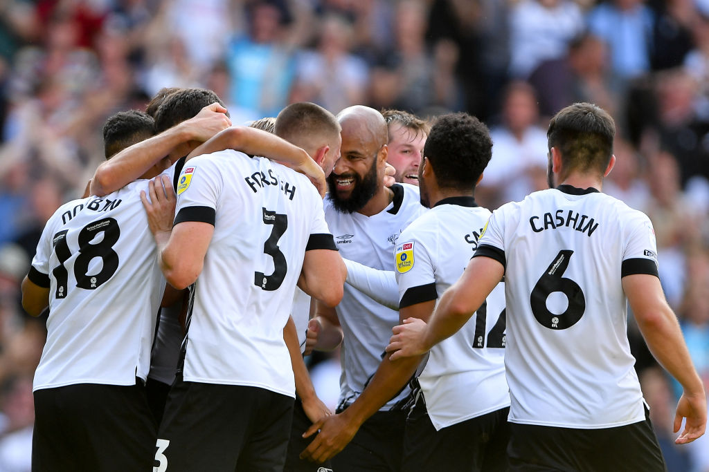 David McGoldrick of Derby County celebrates with his teammates after scoring a gala to make it 2-1 during the Sky Bet League 1 match between Derby County and Peterborough at the Pride Park, Derby on Saturday 27th August 2022.
