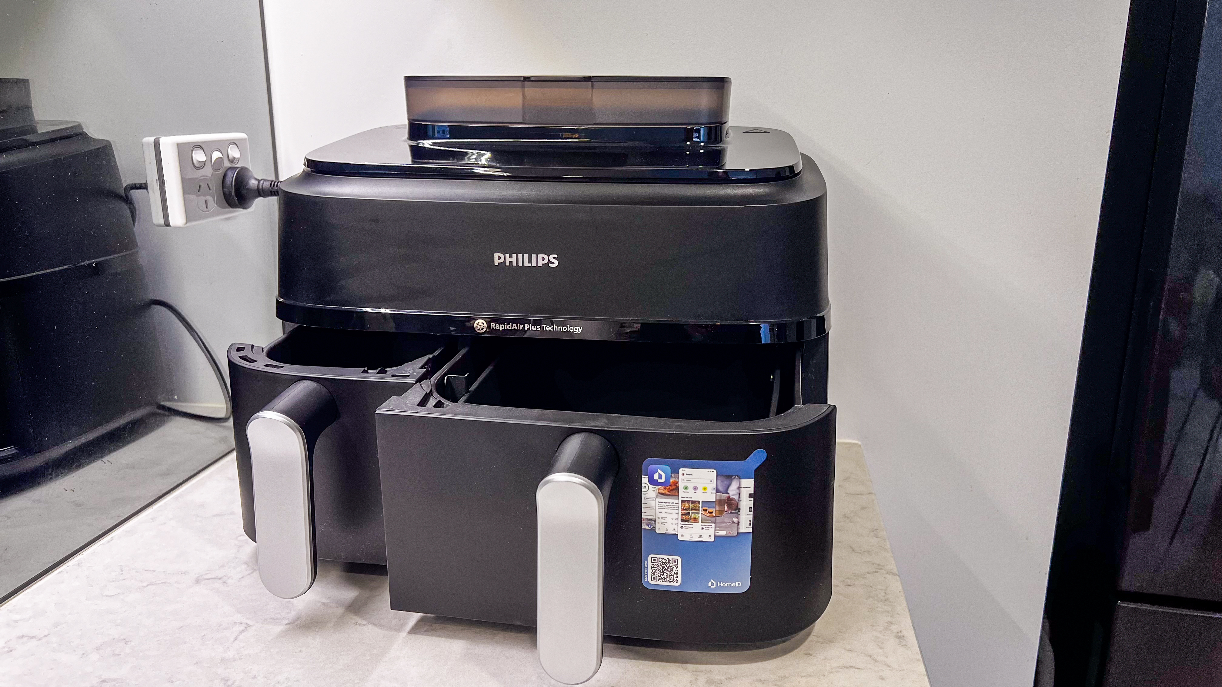 The Philips 5000 Series Dual Basket Air Fryer XXL Steam on a kitchen countertop