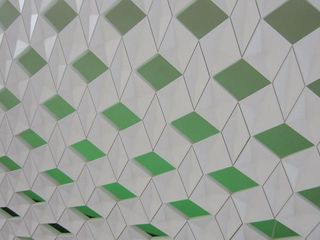 A white and green rhombus geometric pattern