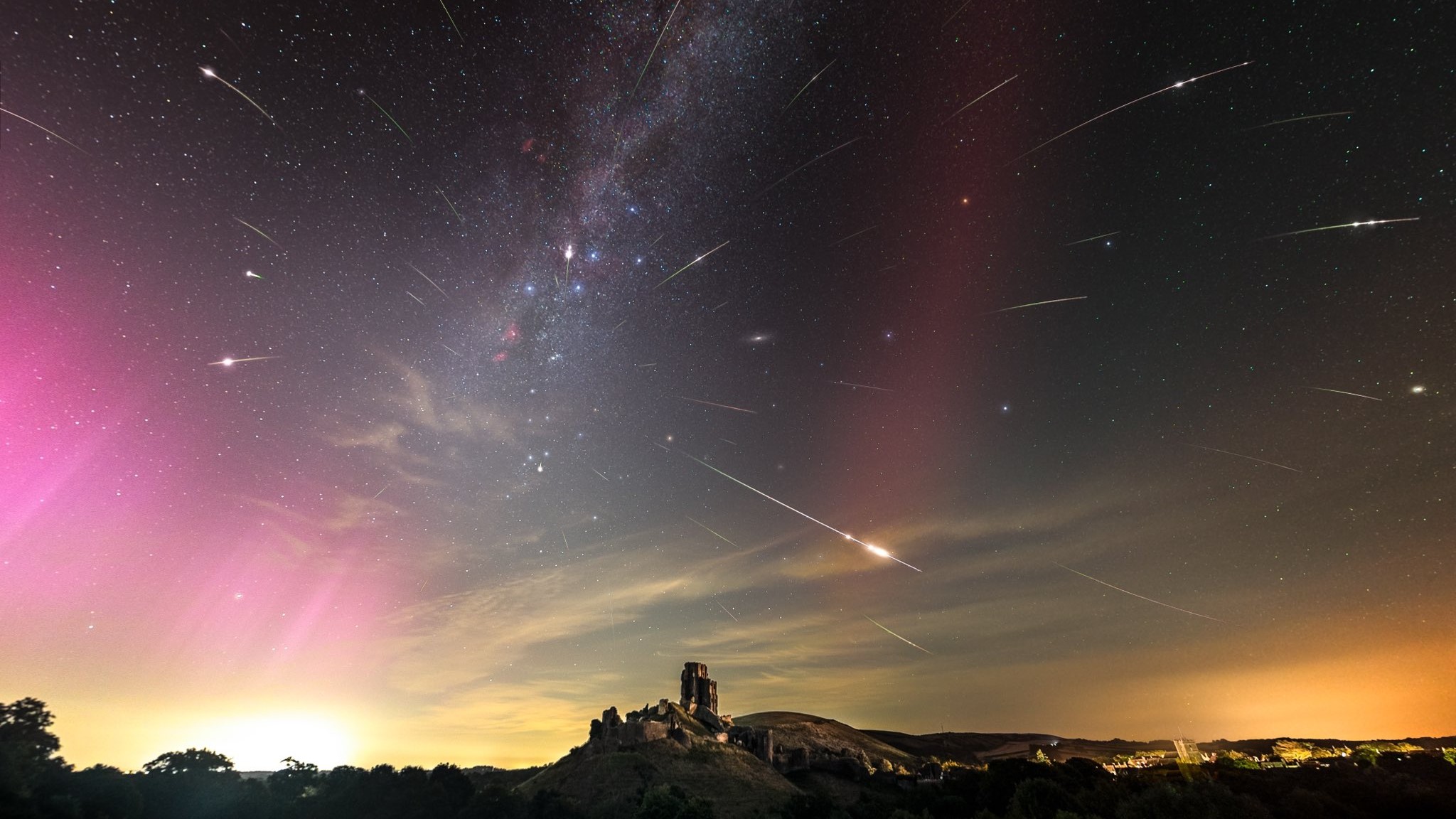 'Once-in-a-lifetime' photo: Perseid meteors, northern lights and rare glowing arc shine over 11th-century castle