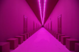 Pink corridor set at Sportmax A/W 2022, one of the best runway sets of the season