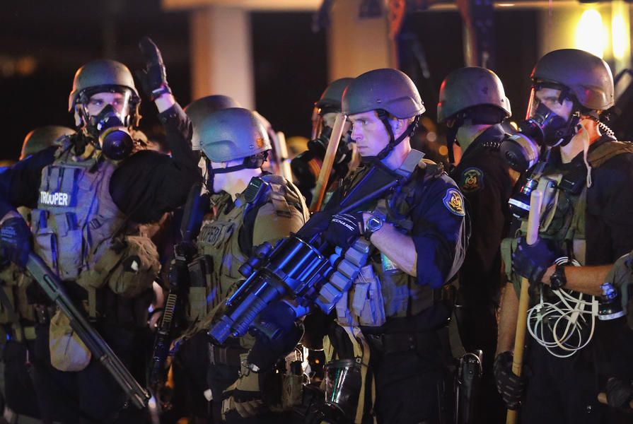 Police in Ferguson came under &amp;#039;heavy gunfire&amp;#039; last night, commander says