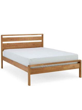 Scandi style solid wood sturdy bed with white mattress
