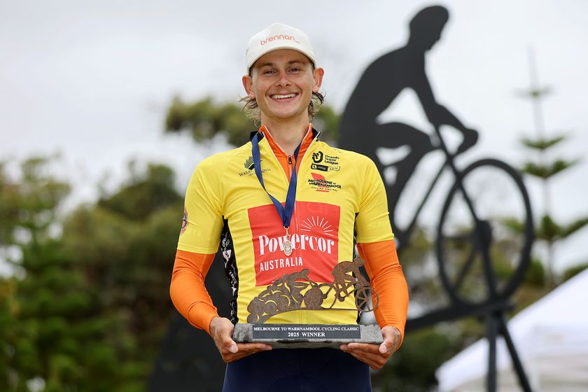 Blake Agnoletto (Team Brennan p/b TP32) claims the trophy after winning the Powercor Melbourne to Warrnambool Cycling Classic 2025 (Pic by Con Chronis/PSL)