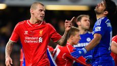 Martin Skrtel of Liverpool FC clashes with Diego Costa of Chelsea