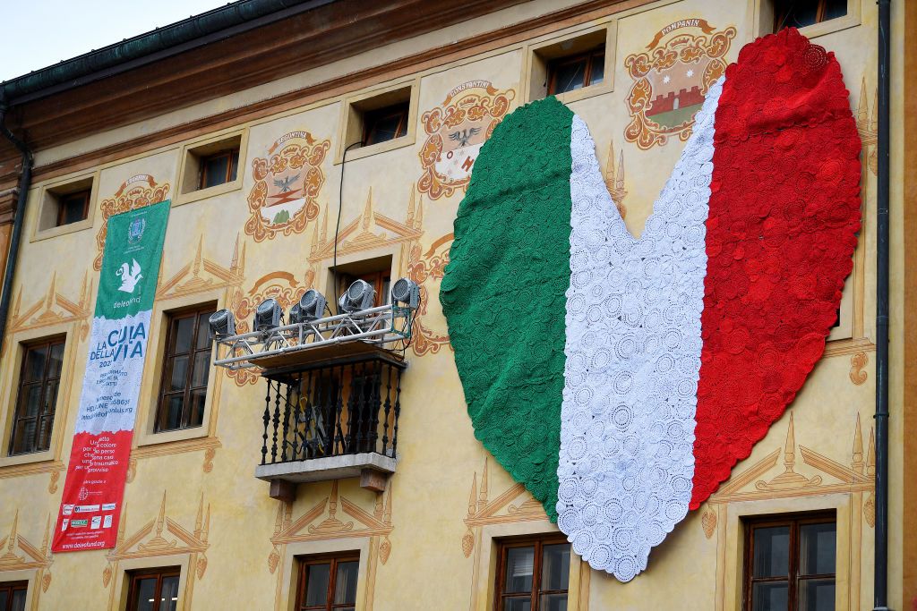 CORTINA DAMPEZZO ITALY MAY 24 Italian decoration at Cortina dAmpezzo 1210m Village at arrival during the 104th Giro dItalia 2021 Stage 16 a 153km stage shortened due to bad weather conditions from Sacile to Cortina dAmpezzo 1210m Italian Flag Detail view Ambience girodiitalia Giro on May 24 2021 in Cortina dAmpezzo Italy Photo by Stuart FranklinGetty Images