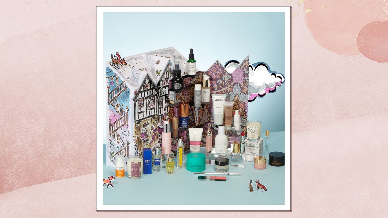 Image of Liberty Beauty Advent Calendar 2024 with products in front, on a pink watercolour background