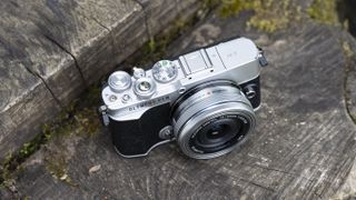 The top plate and controls of the Olympus E-P7 mirrorless camera