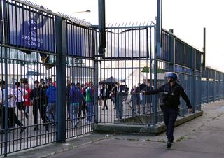 Police used pepper spray against fans outside the the Stade de France