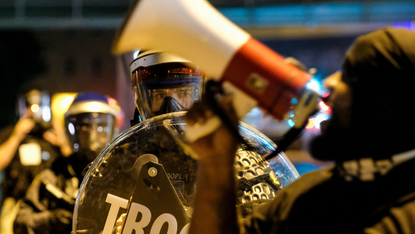 Protester demonstrates against police brutality in Ohio