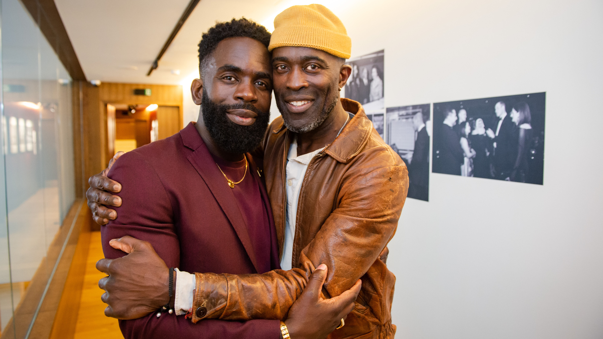 Jimmy Akingbola hugs his older brother, Sola