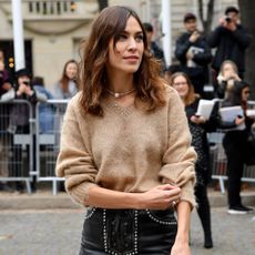 An image of Alexa Chung wearing shorts with tights.