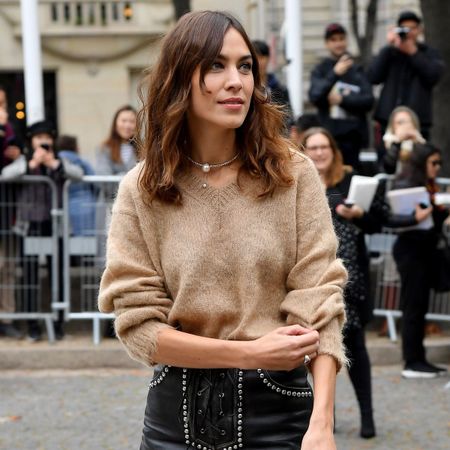 An image of Alexa Chung wearing shorts with tights.