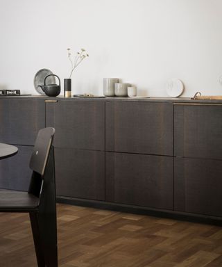 japandi black kitchen with accessories and decor