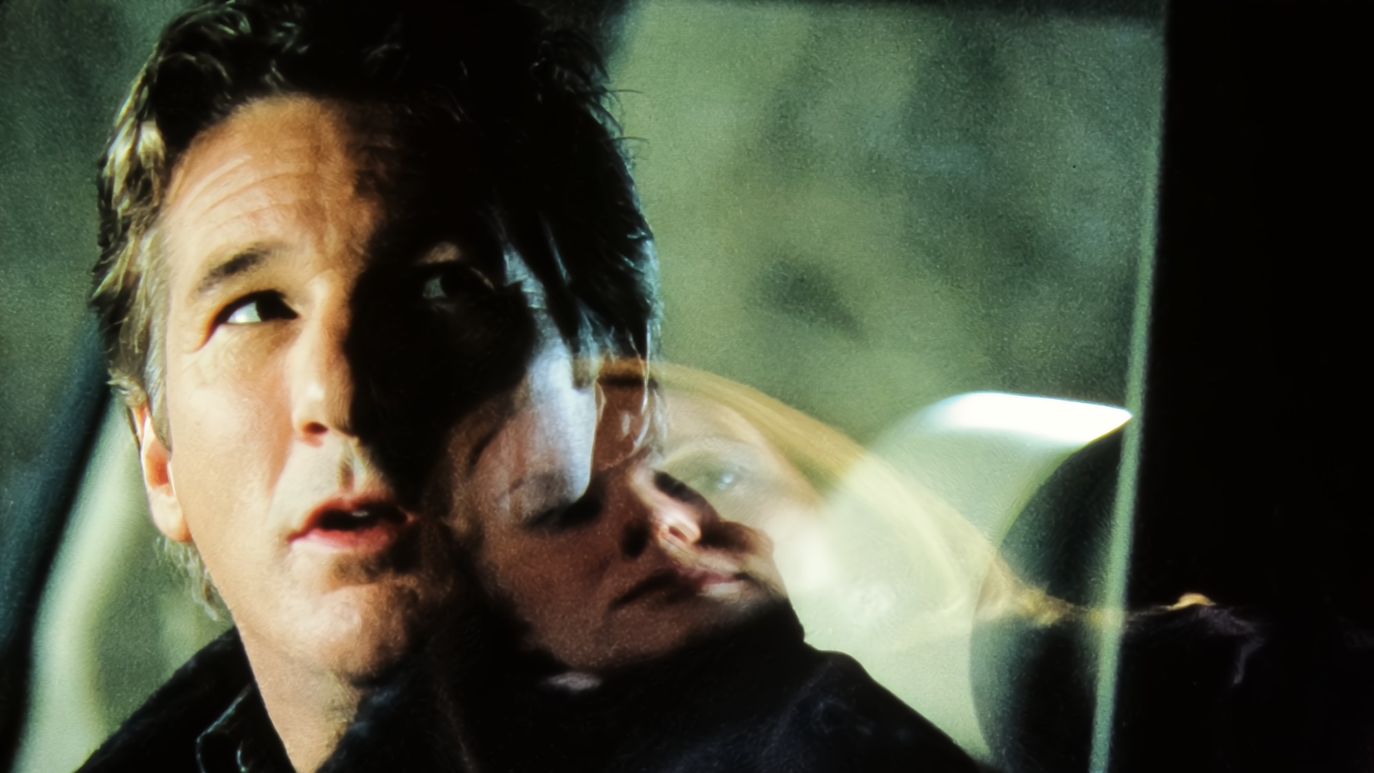 Richard Gere and Laura Linney in The Mothman Prophecies