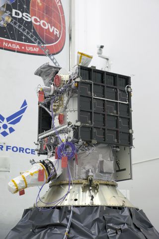 The Deep Space Climate Observatory space weather satellite is prepared for its Feb. 8, 2015 launch atop a SpaceX Falcon 9 rocket in Cape Canaveral, Florida. The satellite will is an early-warning system for solar storms, but will also observe the Earth.